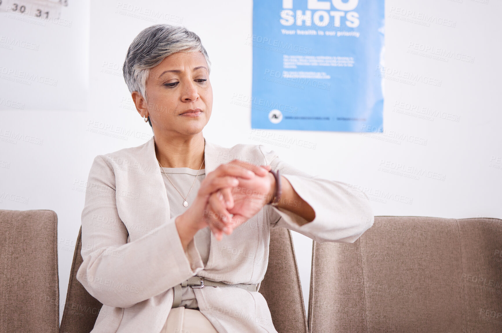 Buy stock photo Watch, time and a senior woman waiting in a clinic for her healthcare appointment or medical checkup. Delay, impatient and a mature female patient sitting in the lobby of a hospital for consultation