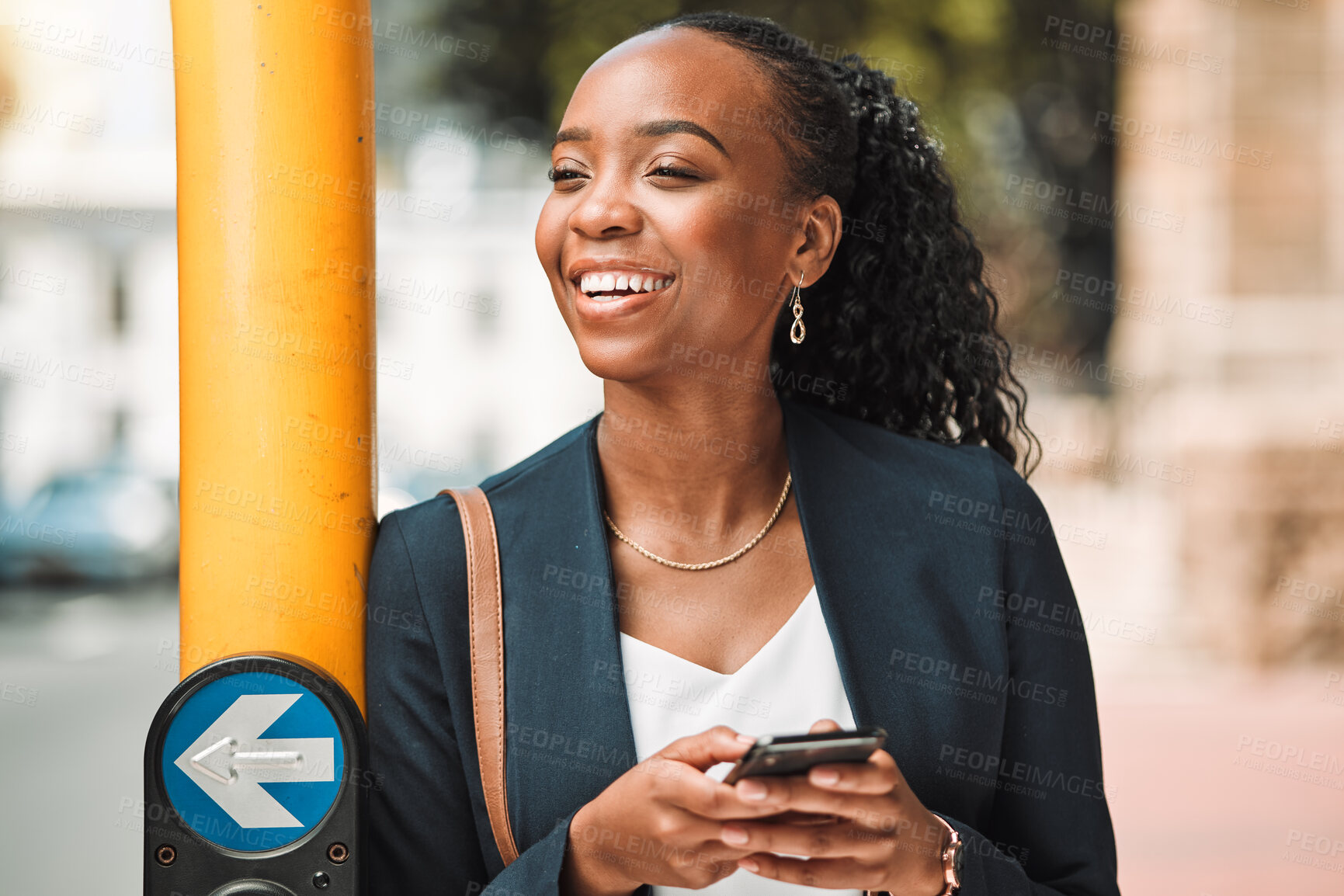 Buy stock photo Happy black woman, phone and city on sidewalk for travel, social media or communication in Cape Town. African female person smile for traveling or networking on smartphone app by street traffic light
