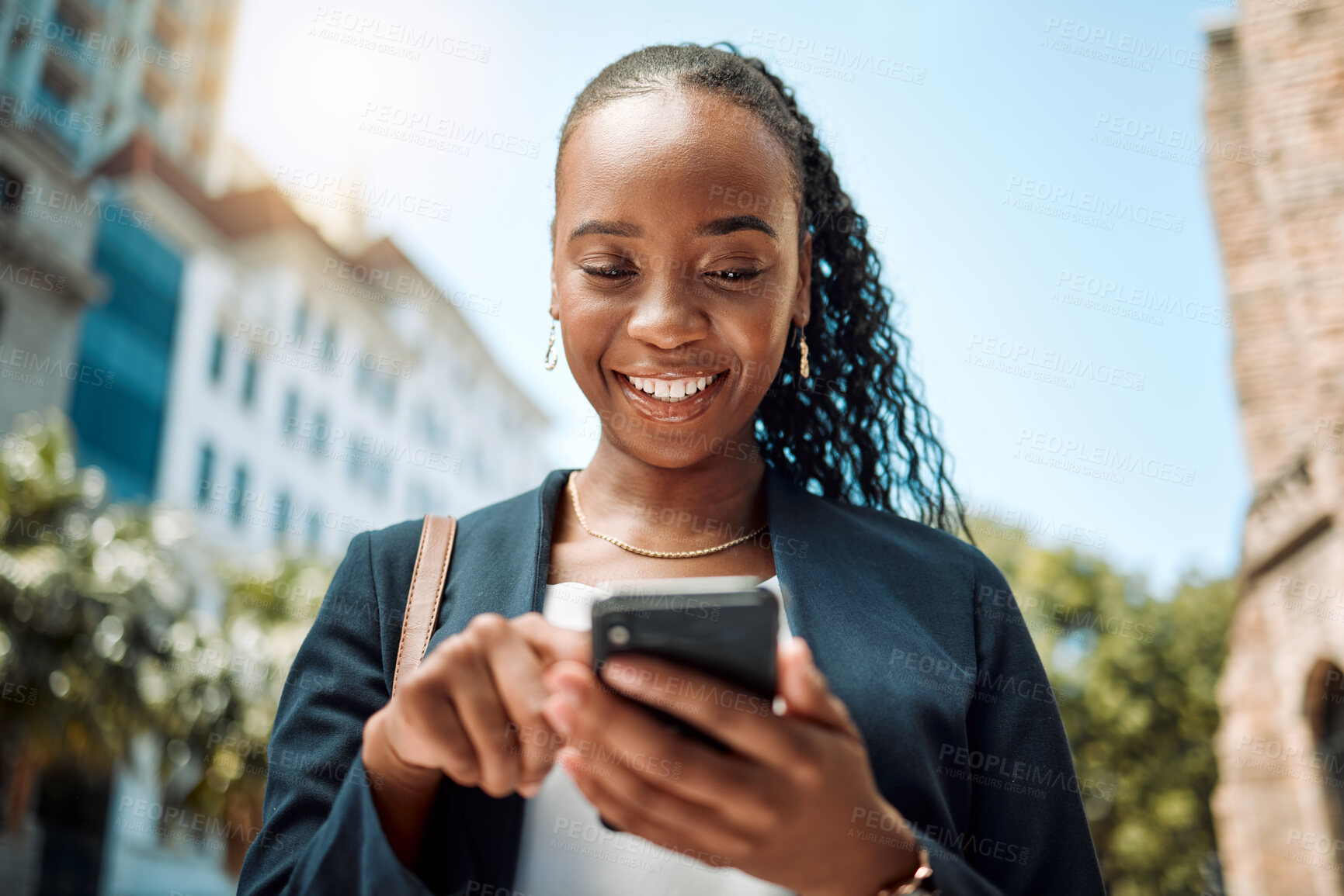 Buy stock photo Phone, walking and a business black woman in the city, searching for directions or typing a message. Mobile, smile and gps with a young female employee looking for a location on a navigation app
