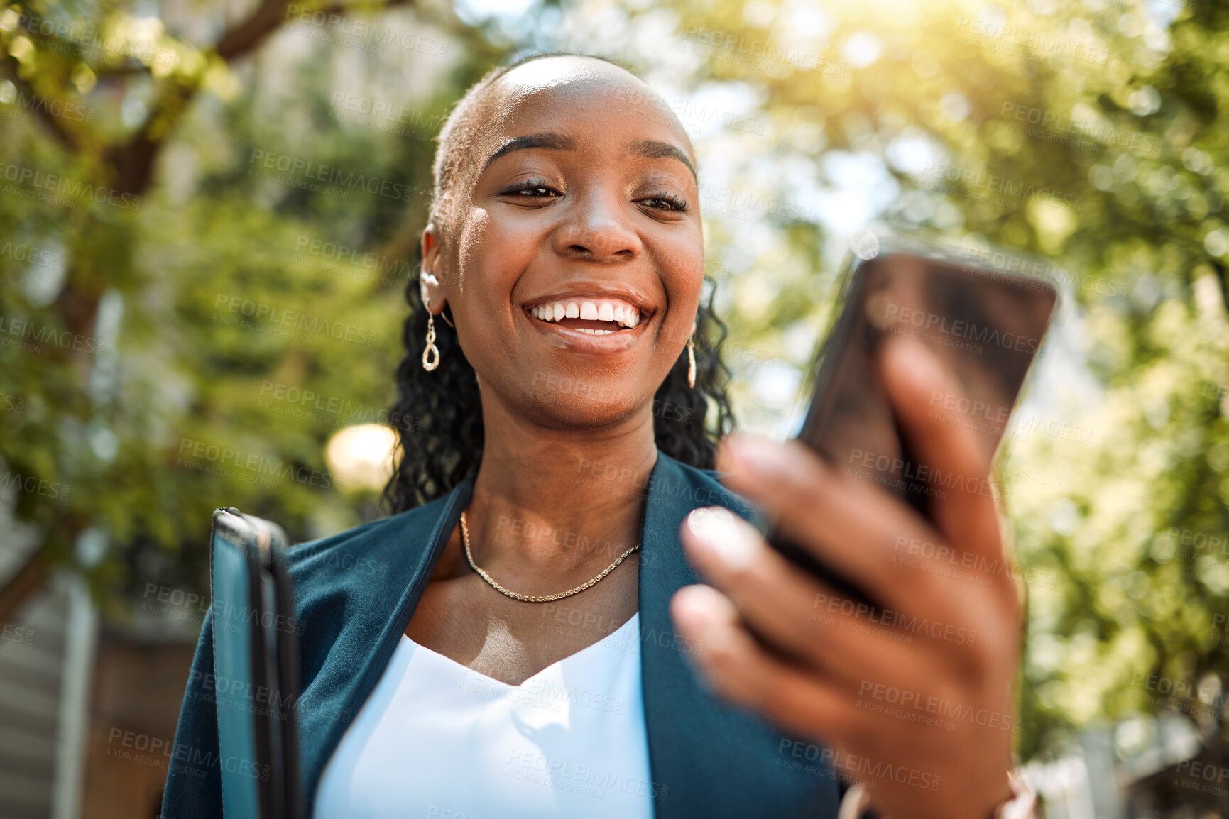 Buy stock photo Happy black woman, phone and city for social media, communication or online browsing at the park. African female person with smile for chatting, texting or networking on mobile smartphone app outside