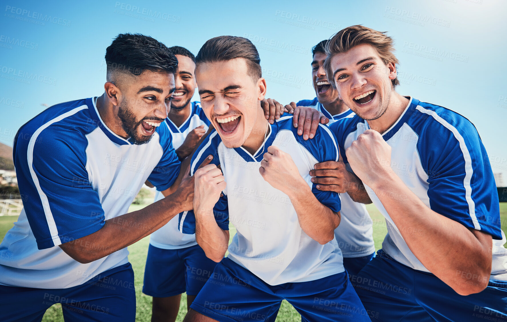 Buy stock photo Football player, game and men celebrate together on a field for sports and fitness win. Happy male soccer team or athlete group with fist for challenge, competition or achievement outdoor on pitch