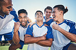 Win, football player and men celebrate together on a field for sports and fitness achievement. Happy male soccer team or athlete group with fist for challenge, competition or pride outdoor on pitch