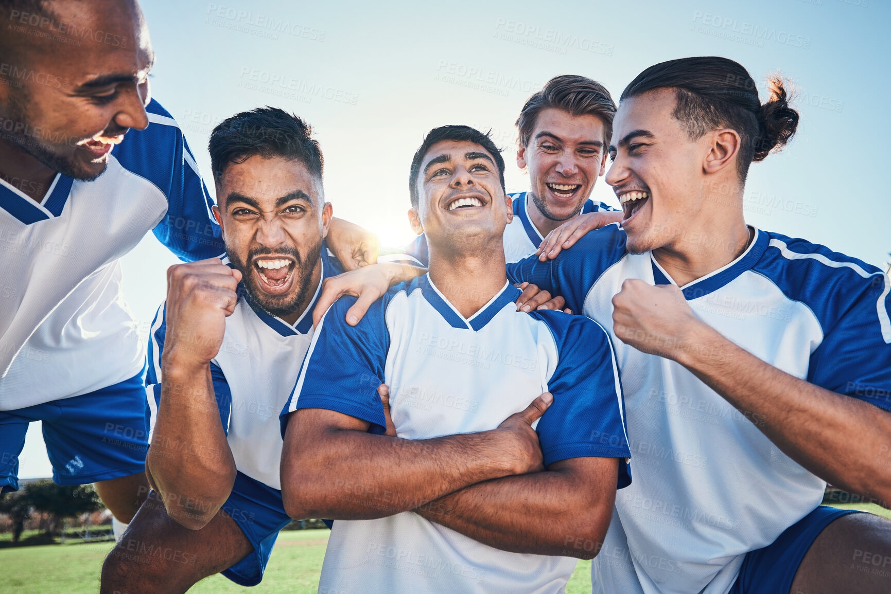 Buy stock photo Win, football player and men celebrate together on a field for sports and fitness achievement. Happy male soccer team or athlete group with fist for challenge, competition or pride outdoor on pitch