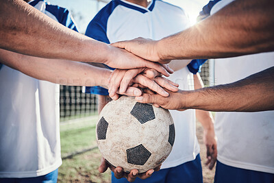 Buy stock photo Football, hands together and collaboration for support, sports and training at stadium. Teamwork, group huddle and soccer players with motivation for exercise, workout goal and success in competition