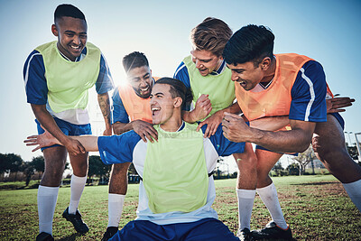 Buy stock photo Football team, game and men celebrate together on a field for sports and fitness win. Happy male soccer player or athlete group for challenge, training or performance achievement outdoor on pitch