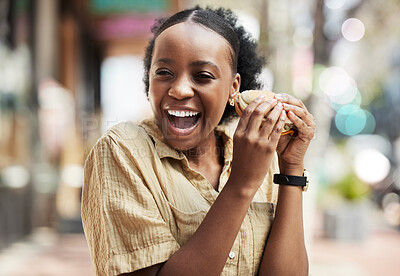 Buy stock photo Happy, black woman and eating a sandwich, lunch or food in the city, urban restaurant or customer on break from work with happiness, Burger, meal or African person at outdoor brunch or cafeteria