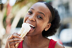 Portrait, happy black woman and eating ice cream cone for frozen dessert, cool snack and sweet food outdoor in summer. Face, smile and young female person lick scoop of melting vanilla gelato in city
