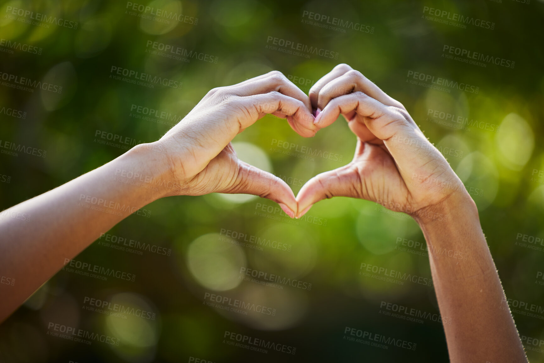 Buy stock photo Hands, heart as a symbol or love or health with a person outdoor in nature on a blurred background for sustainability. Like, romance or valentines day with green gesture in a garden or yard in summer