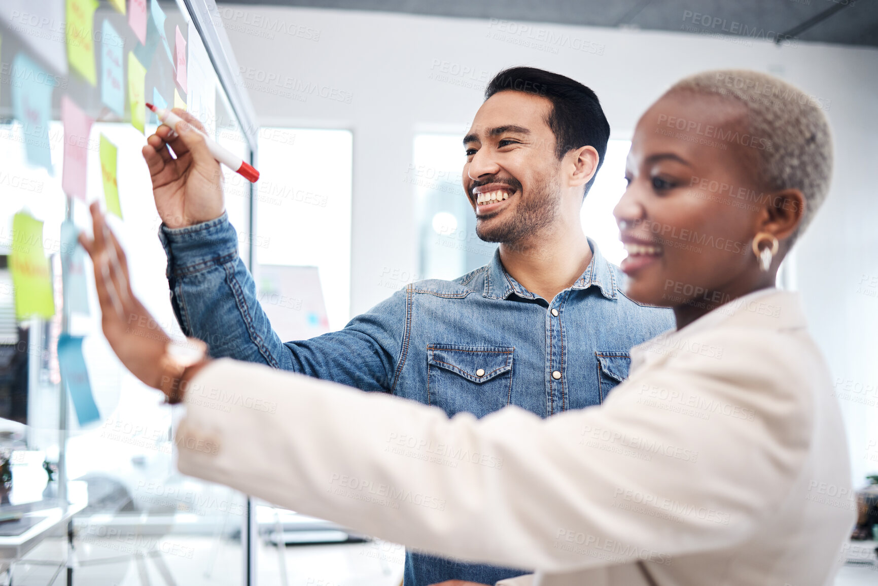 Buy stock photo Happy creative people, writing and glass board for schedule planning, strategy or brainstorming at office. Man and woman in teamwork for startup project plan, sticky note or tasks at the workplace