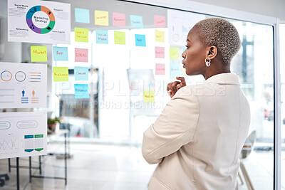 Buy stock photo Black woman, thinking and glass board for project management, marketing or planning at office. African female person, manager or employee checking project plan, tasks or statistics at the workplace