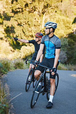 Buy stock photo Men, forest and cycling partnership with friends, talk and helmet for training, exercise and pointing in summer. Cyclist athlete, teamwork and sightseeing on journey, workout and adventure with smile