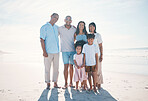 Travel, beach and portrait of happy family with grandparents at the sea or ocean for love, care and happiness. Happy, sun and parents with children or kids bonding on a holiday for freedom on sand