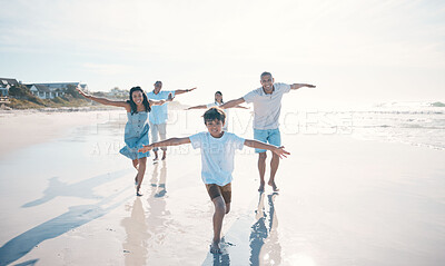 Buy stock photo Fly, beach and happy family running or playing together at the sea or ocean bonding for love, care and happiness. Summer, sun and parents with children or kids and grandparents on holiday for freedom