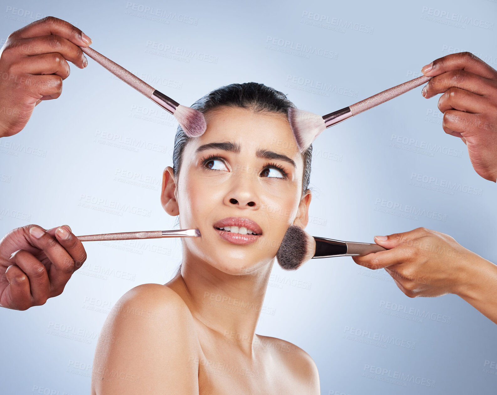 Buy stock photo Brush, makeup and confused face of woman in studio for wellness, beauty and cosmetics on blue background. Cosmetology, skincare and girl with brushes for cosmetic application, foundation and products