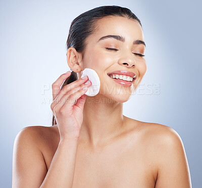 Buy stock photo Skincare, pad and asian woman in studio for makeup removal, toner or hydration on grey background. Smile, beauty and asian lady wellness model with facial cotton for cleaning or glowing skin routine