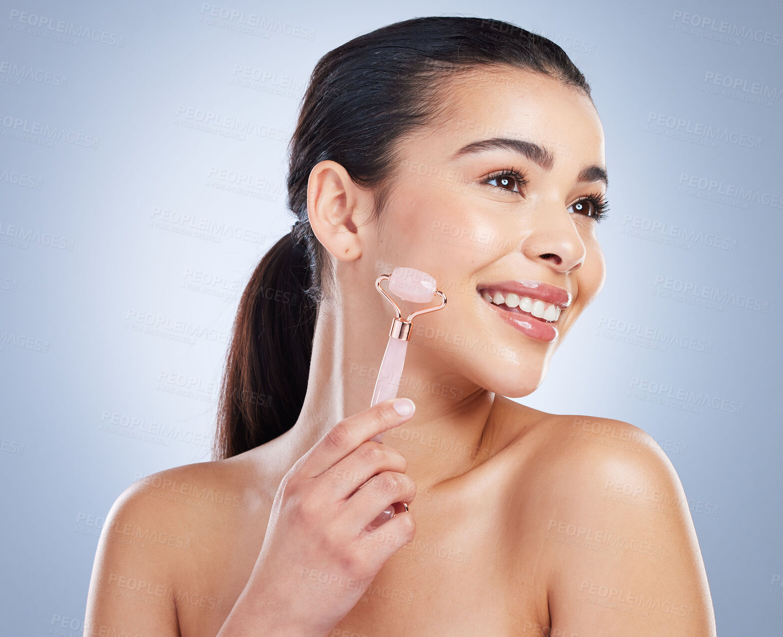 Buy stock photo Derma roller, skincare and asian woman in studio for anti aging, cosmetic or face massage on grey background. Rose quartz, facial and lady wellness model with luxury, beauty or lymphatic drainage