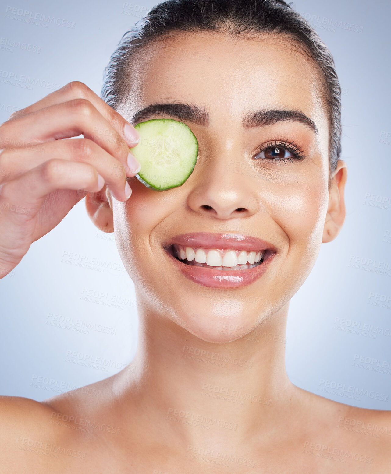 Buy stock photo Cucumber, skincare and asian woman portrait in studio happy for wellness or anti aging on grey background. Fruit. detox and lady face model smile for antioxidants, facial or beauty mask treatment