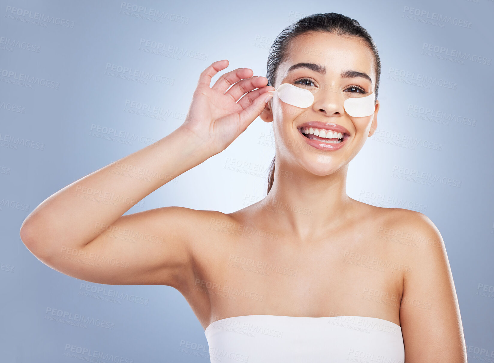 Buy stock photo Skincare, eye mask and portrait of happy woman in studio for wellness, healthy skin and facial. Dermatology aesthetic, salon and face of female person with pads for anti aging, cosmetics and beauty