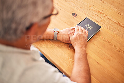 Buy stock photo Bible, hands or above of old man in prayer for support, faith or hope in Christianity in retirement. Worship, praying or senior person studying, reading or learning book of God in spiritual religion