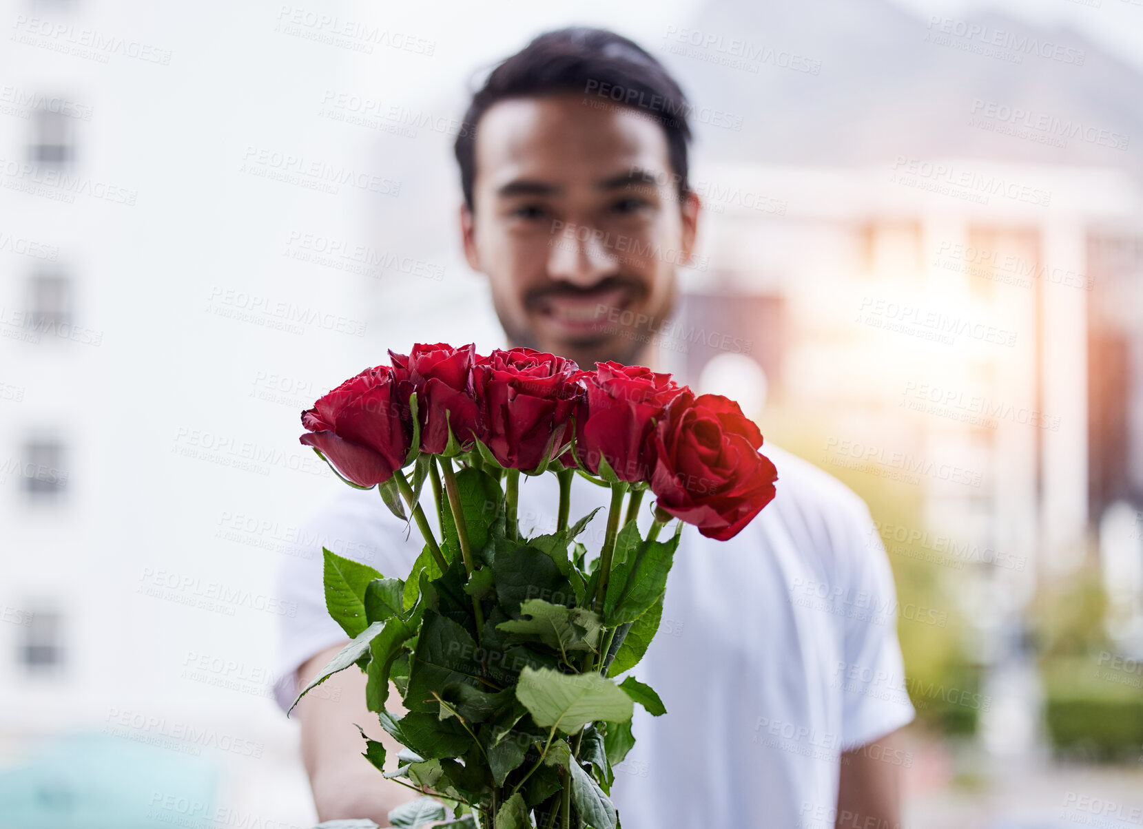 Buy stock photo Love, gift and portrait of happy man with roses for date, romance and valentines day. Smile, romantic hope and person giving bouquet of flowers in city, proposal or engagement on blurred background.