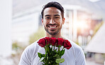 Smile, portrait and happy man with bouquet of roses for date, romance and hope for valentines day. Love confession, romantic gift and person holding flowers outside in city for proposal or engagement