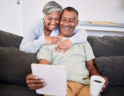 Buy stock photo Video call, happy and senior couple with a tablet on a sofa while relaxing and bonding together. Smile, love and elderly man and woman in retirement on a virtual conversation with digital technology.