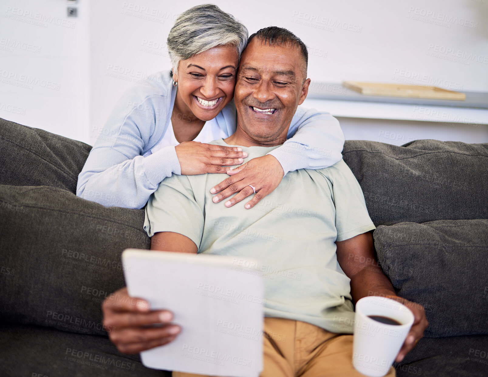 Buy stock photo Video call, happy and senior couple with a tablet on a sofa while relaxing and bonding together. Smile, love and elderly man and woman in retirement on a virtual conversation with digital technology.