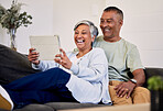 Love, tablet and senior couple laughing at funny social network meme, web comic or watch comedy podcast video. Comedy website, marriage and elderly people laugh at retirement joke in Mexico home
