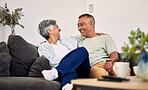 Love, smile or laughing senior couple bonding, relax and enjoy quality time together, funny conversation or chat. Lounge communication, marriage humour or elderly people laugh at home retirement joke