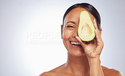 Buy stock photo Skincare, face and mature woman with avocado in studio isolated on a white background mockup. Happy, natural fruit and portrait of senior model with nutrition, healthy diet and omega 3 for anti aging