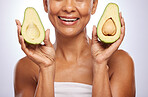 Avocado, skincare or happy woman with fruit for a healthy diet, detox or vitamins with beauty in studio. Wellness, hands  closeup or face of model smiling in dermatology treatment on white background