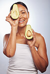 Senior, health and portrait of woman with avocado for skincare, nutrition or diet. Happy, face and elderly model or lady with food for wellness, beauty and detox isolated on a studio background
