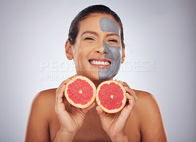 Buy stock photo Woman with grapefruit, skincare and face mask with charcoal, clay or natural beauty product with vitamin c, wellness or detox. Fruit, healthy cosmetics and girl happy with dermatology or facial care 