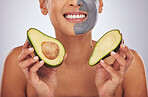 Woman, skincare, with avocado and face mask with charcoal, clay or natural beauty product for wellness, detox or nutrition. Fruit, healthy cosmetics and girl happy with green or vegan facial care 