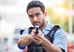 Gun, police man or security guard for protection service, safety and patrol officer in city. Law enforcement, professional supervision and face of asian crime worker in uniform outdoor with weapon
