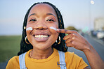 Portrait, smile and a black woman with sunscreen on her face to protect her skin using spf treatment. Summer, street and blurred background with a happy young female person outdoor to apply lotion