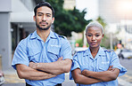 Woman, man and security guard portrait in street, arms crossed or serious with support, safety or teamwork. Protection agent, smile and face for partnership, solidarity and pride for job in metro cbd