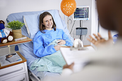 Buy stock photo Healthcare, woman and patient with recovery, smile and consultation with good news, help and treatment. Female person, doctor and lady in a hospital bed, healing and diagnosis with procedure success