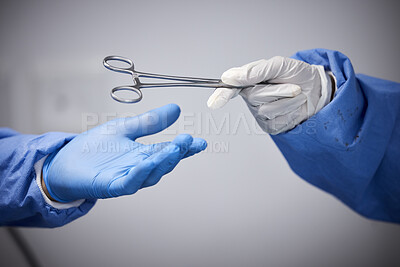Buy stock photo Surgery, hands or doctors with scissors with medicine or surgical procedure or healthcare in hospital. People, medical safety tools or closeup of surgeon in gloves helping in operating room in clinic