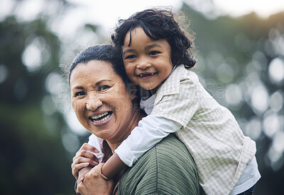 Buy stock photo Funny face, grandmother and piggyback kid at park, nature or outdoor on vacation. Portrait, happy and grandma carrying child, bonding and laughing, care and enjoying quality time together with bokeh.
