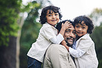 Portrait, smile and father with children at park, nature or outdoor on vacation. Face, happy family and kids with dad, bonding and having fun, care or enjoying quality time together on holiday travel