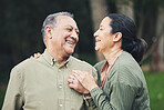 Love, talk and mature couple in nature in an outdoor park with care, happiness and romance. Happy, smile and senior man and woman in retirement embracing and bonding together in a green garden.