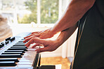 Hands, man and piano keyboard for talent, skills and creativity of band in home studio. Closeup, musician and fingers playing electrical instrument in audio performance, sound artist or entertainment