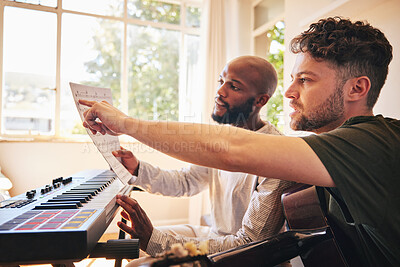 Buy stock photo Music notes, piano and friends with guitar in home together to practice reading. Electric keyboard, acoustic instrument and musician team, creative men and artists with paper for production of sound.