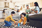 Family home, kids and siblings with toys, living room and play on floor with grandparents, parents or games. Men, women and children for building blocks, development and learning in lounge in house
