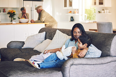 Buy stock photo Happy, mother and boy on a couch, love and quality time with happiness, loving together and cheerful. Female parent, mom and mama with male child, kid on a sofa and family in a home, care and break