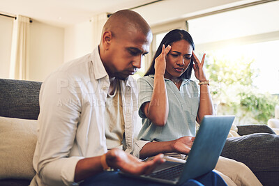 Buy stock photo Stress, frustrated and couple on a laptop in the living room  of their modern home paying their bills. Upset, technology and young man and woman doing online banking with computer on sofa at a house.