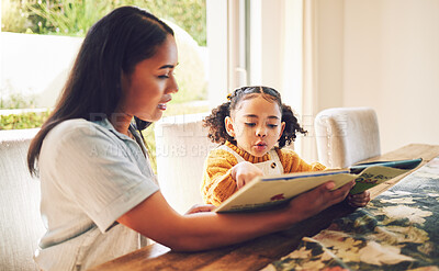 Buy stock photo Mom, girl child and book for reading, spelling and learning for literature, language or studying in family home. Storytelling, mother and daughter with teaching, education and focus for development