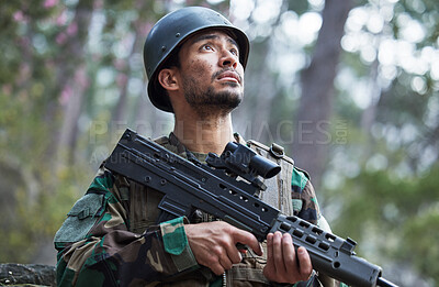 Buy stock photo Soldier, army and man thinking with gun in forest training, outdoor shooting or military exercise, mission and focus. Rifle, veteran and young person search woods or nature in battlefield gear vision