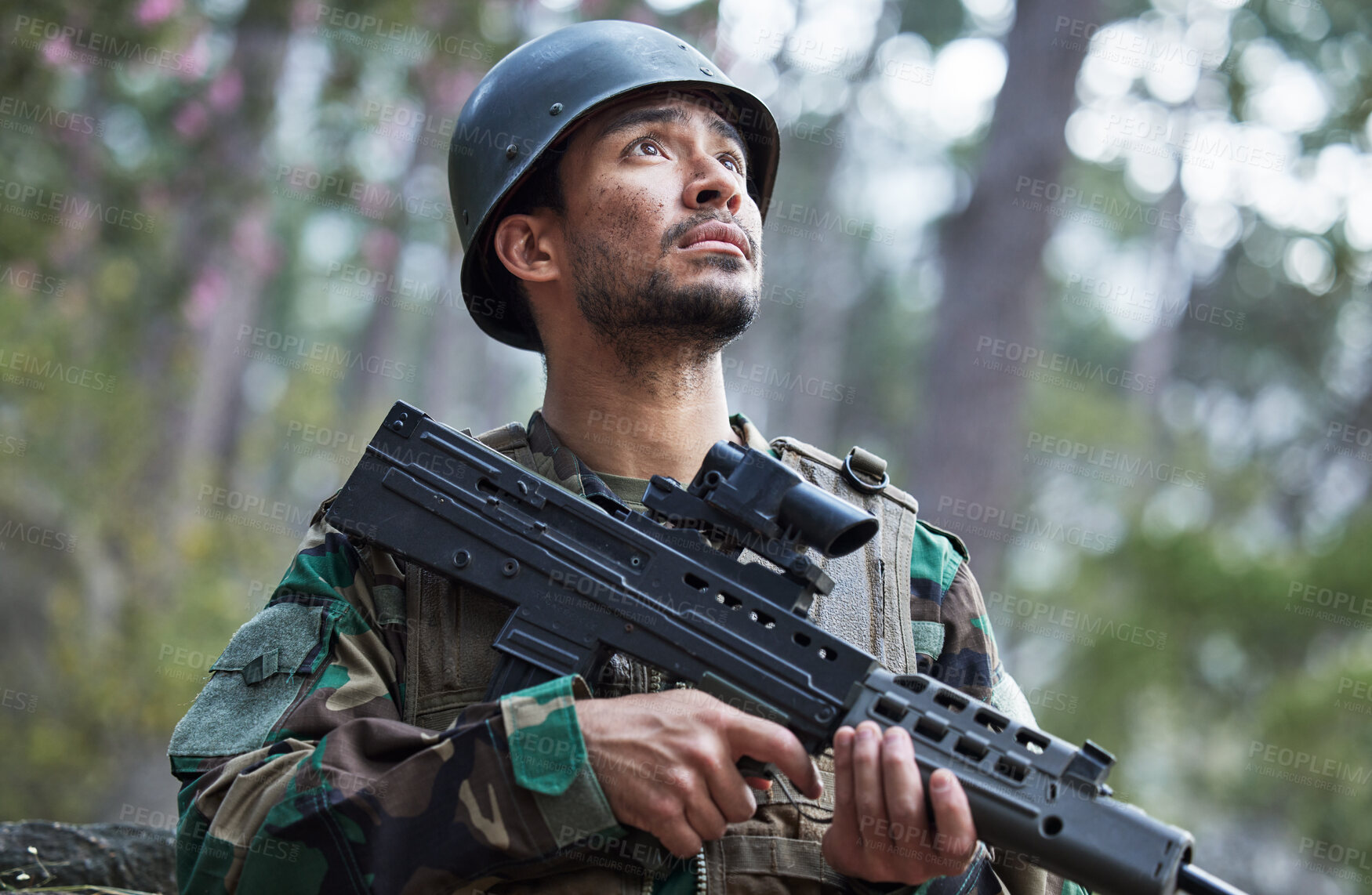 Buy stock photo Soldier, army and man thinking with gun in forest training, outdoor shooting or military exercise, mission and focus. Rifle, veteran and young person search woods or nature in battlefield gear vision